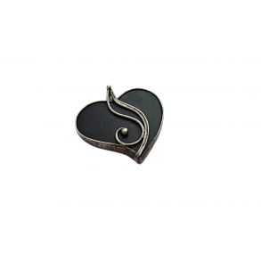 Slate “heart” pendant decorated with soldering technique.